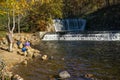 Family Fishing for Trout at Douthat State Park Royalty Free Stock Photo